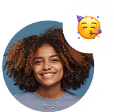Smiling young woman with curly hair against a blue background and a party face emoji in the top right corner.